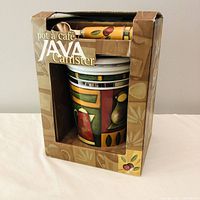 Front of boxed Java canister set showing canister and scoop