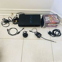 Console, controller, cables, game stack overview