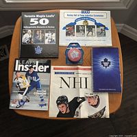 All seven memorabilia items laid out on table