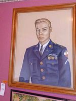 Front view of the framed portrait painting showing subject and frame