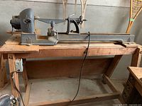 Full view of Beaver lathe on wooden bench