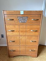 Front view showing entire dresser front, handles, inlay, overall design