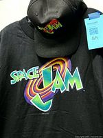 Front view of T-shirt logo and snapback hat