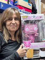 Person holding boxed 10-inch Franken Berry Funko Pop
