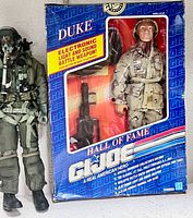 Boxed Hall of Fame Duke figure and loose geared figure side by side