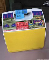 Front view showing TMNT artwork and carry handle