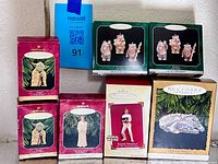 Group shot of seven Hallmark Star Wars ornament boxes