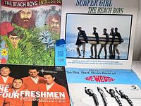 Group shot of all four album covers