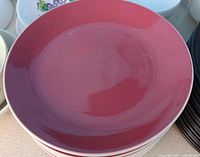 Front view of burgundy dinner plate