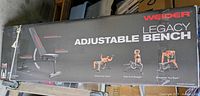 Retail box showing Weider Legacy Adjustable Bench image and branding