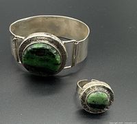 Bracelet and ring side-by-side showing design and stones