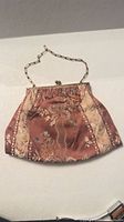 Full view of floral silk evening purse showing front and chain handle