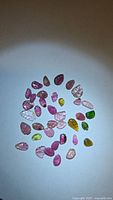 All stones arranged in circle showing variety of colours and cuts