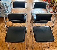 Front view of all four folding chairs