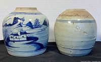 Front view of both ginger jars side by side