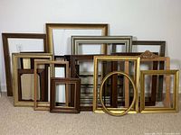 Group shot of all frames leaning against wall