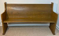 Full front view of pine church pew bench