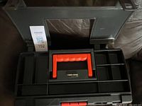 Open toolbox showing interior compartments and handle