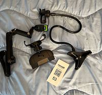 All three phone mounts laid out