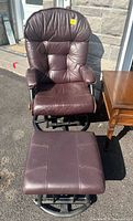 Front view of rocker chair and ottoman showing overall design and material