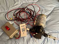 Overall lot showing pump, wiring harness, and switch