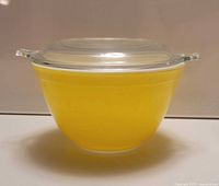 Yellow Pyrex casserole with lid side profile