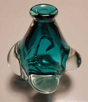 Oblique top view showing teal interior and clear encased lobes