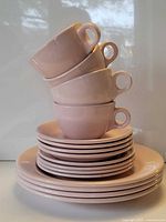 Stacked plates and cups showing quantity and color