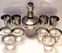 Full set showing decanter, six highball tumblers, six old fashioned glasses