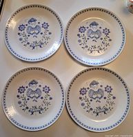Full view of four matching Figgjo Lotte dinner plates