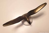 Top view of brass seagull on marble base