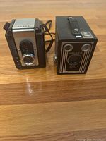 Front view of Argus 75 and Kodak Brownie Target Six-20 cameras side by side