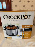 Front view of boxed Crock-Pot Classic slow cooker