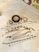 Overview of all jewelry pieces spread on table