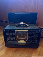 Front view of Zenith 8G005 radio showing dial, grille and overall condition