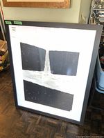 Front view of framed serigraph showing full artwork and frame