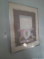 Full view of framed abstract collage showing artwork and frame