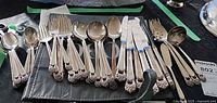 Group view of assorted Rogers silver-plate flatware showing pattern and quantity