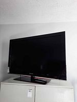 Front view of Samsung LCD TV on stand