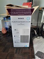 Front of Winix retail box showing model and features