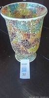 Full view of footed crackle mosaic glass vase