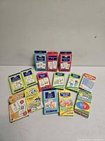 Full lot overview showing all 14 card packs laid out