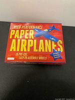 Front of sealed High-Performance Paper Airplanes kit box