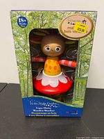 Front of sealed box showing Upsy Daisy wooden stacker