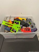 Top view of bin showing assorted Hot Wheels track parts