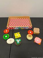 All components laid out with storage tray visible