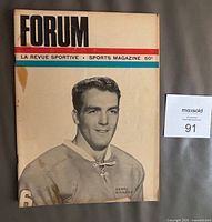Front cover showing Henri Richard photo, FORUM masthead, staining visible