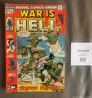 Front cover showing title, artwork, price, issue number