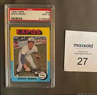 Front of graded 1975 Topps Steve Renko card in PSA slab