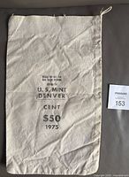 Front of U.S. Mint Denver 1975 canvas bag showing printed text and drawstring